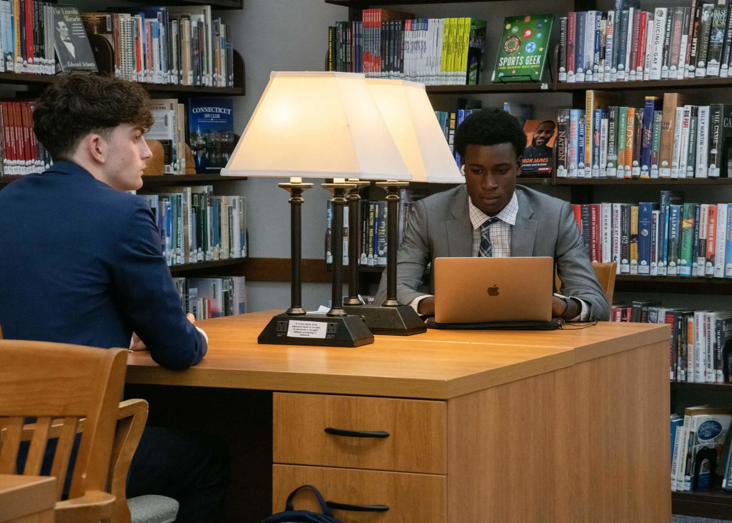 Avon Old Farms students studying in the library