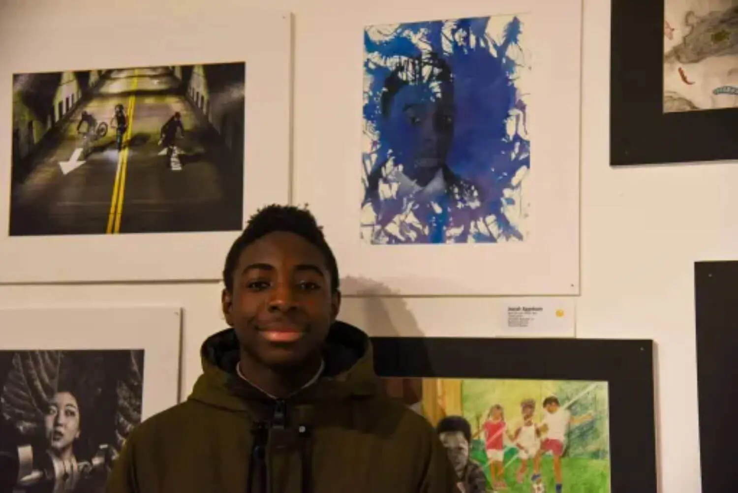 Freshman Isaiah Agyekumi earned third place out of all submissions for his charcoal/ink drawing, "Mysterious Blue Boy."