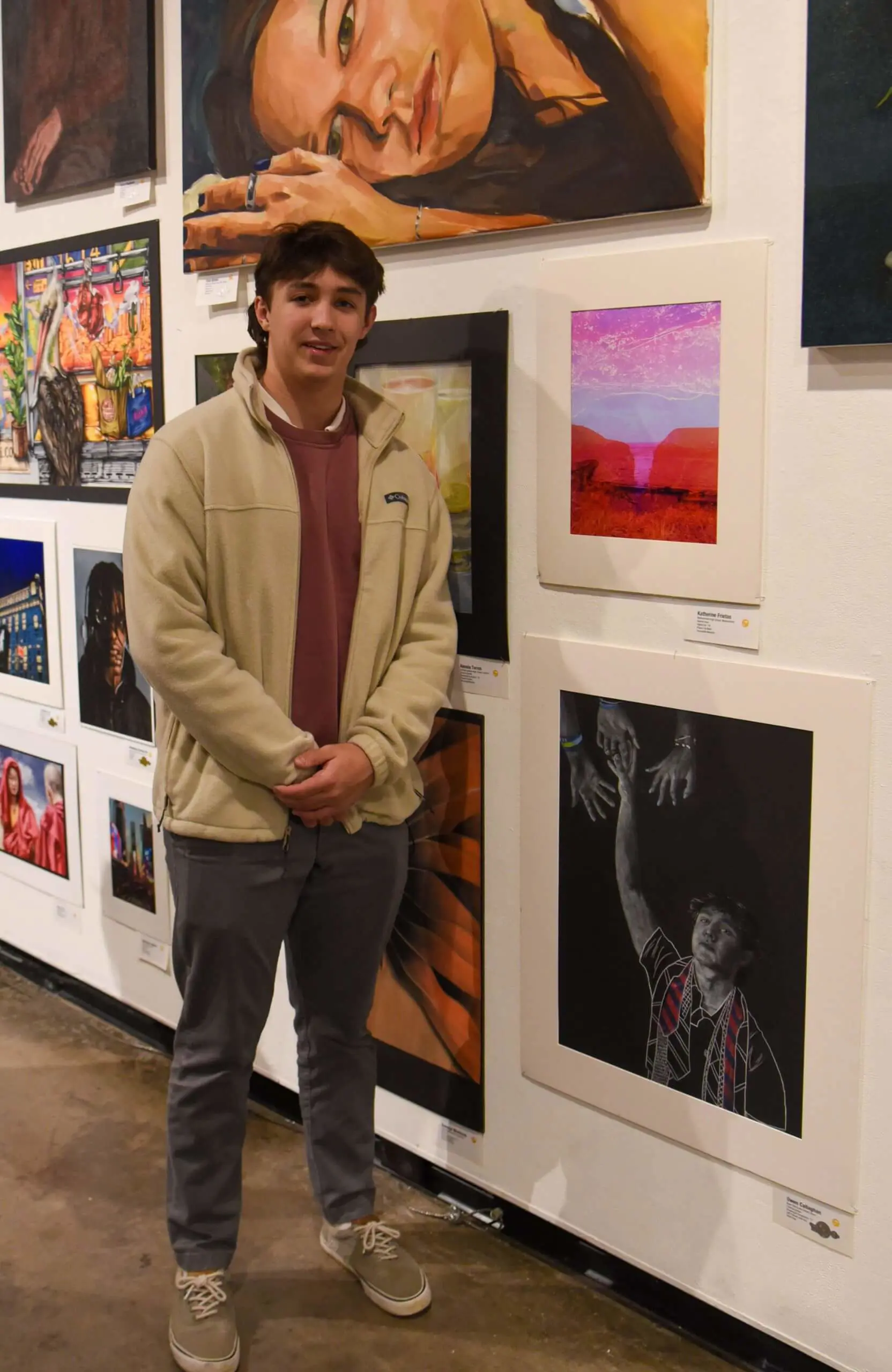 Avon old Farms student with their artwork at the Annual Connecticut Scholastic Art Awards show