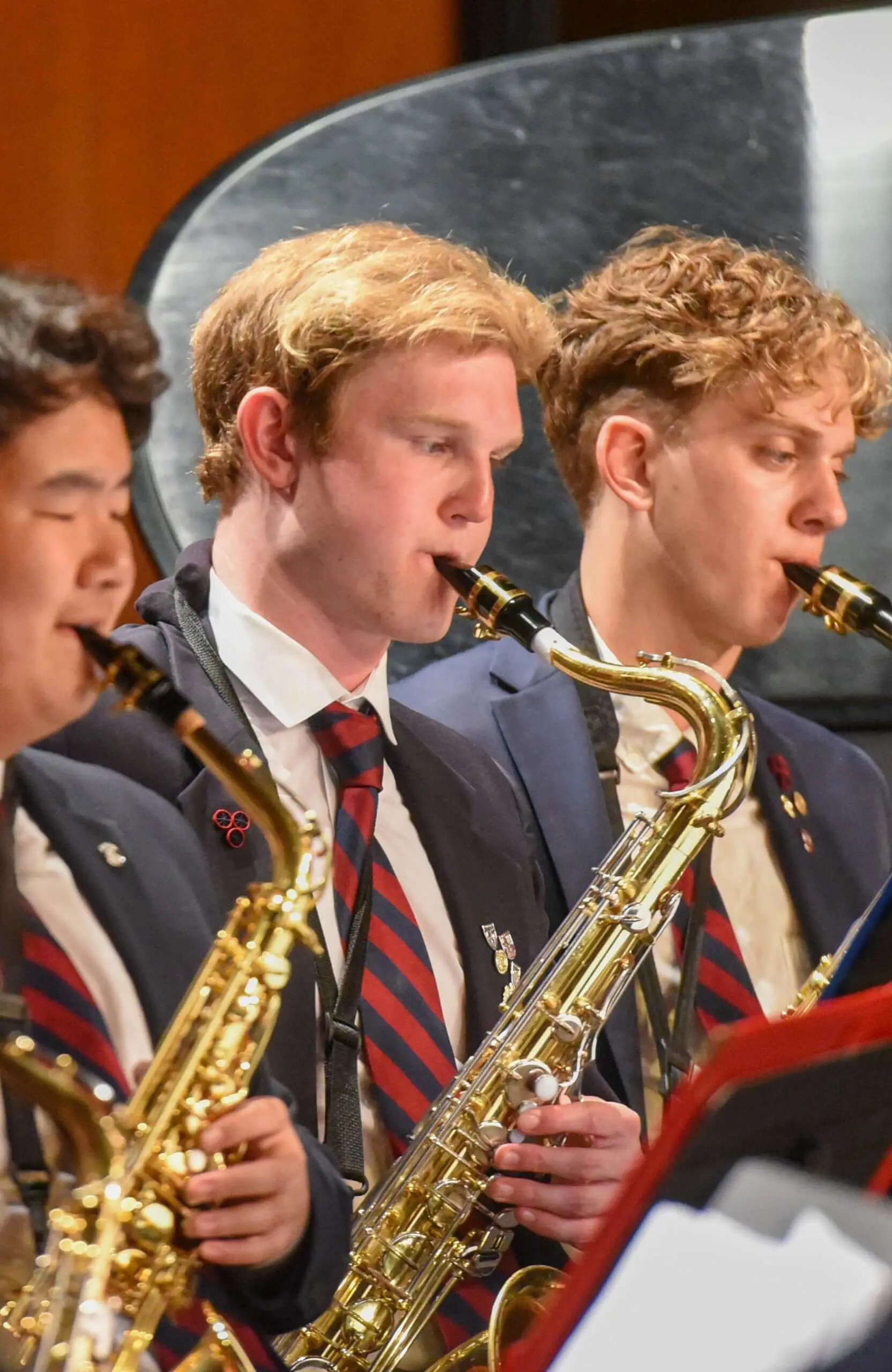 Avon Old Farms students playing saxophones in concert