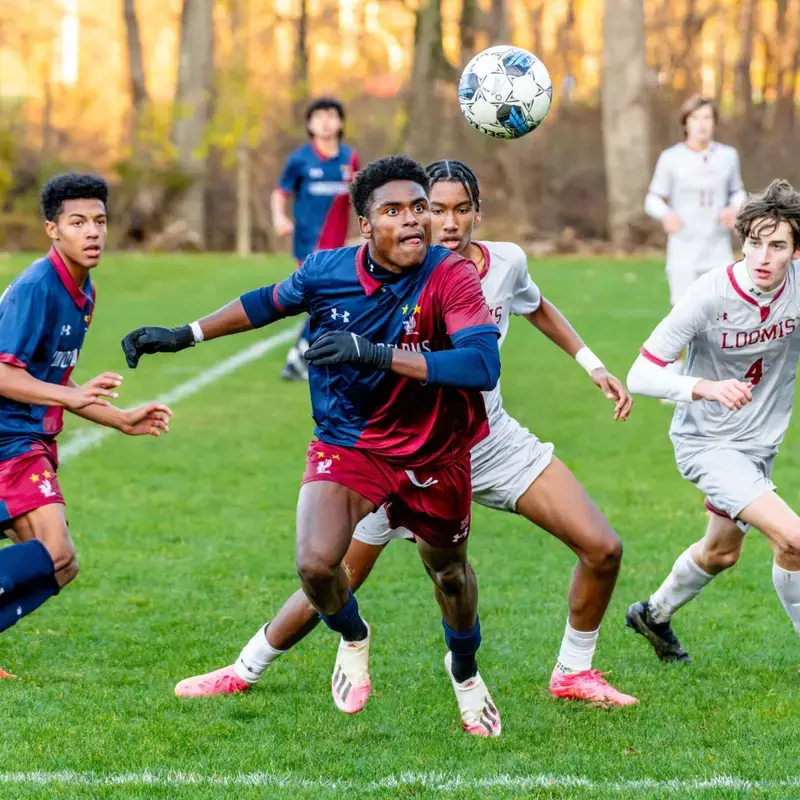 Avon Old Farms students playing a soccer match