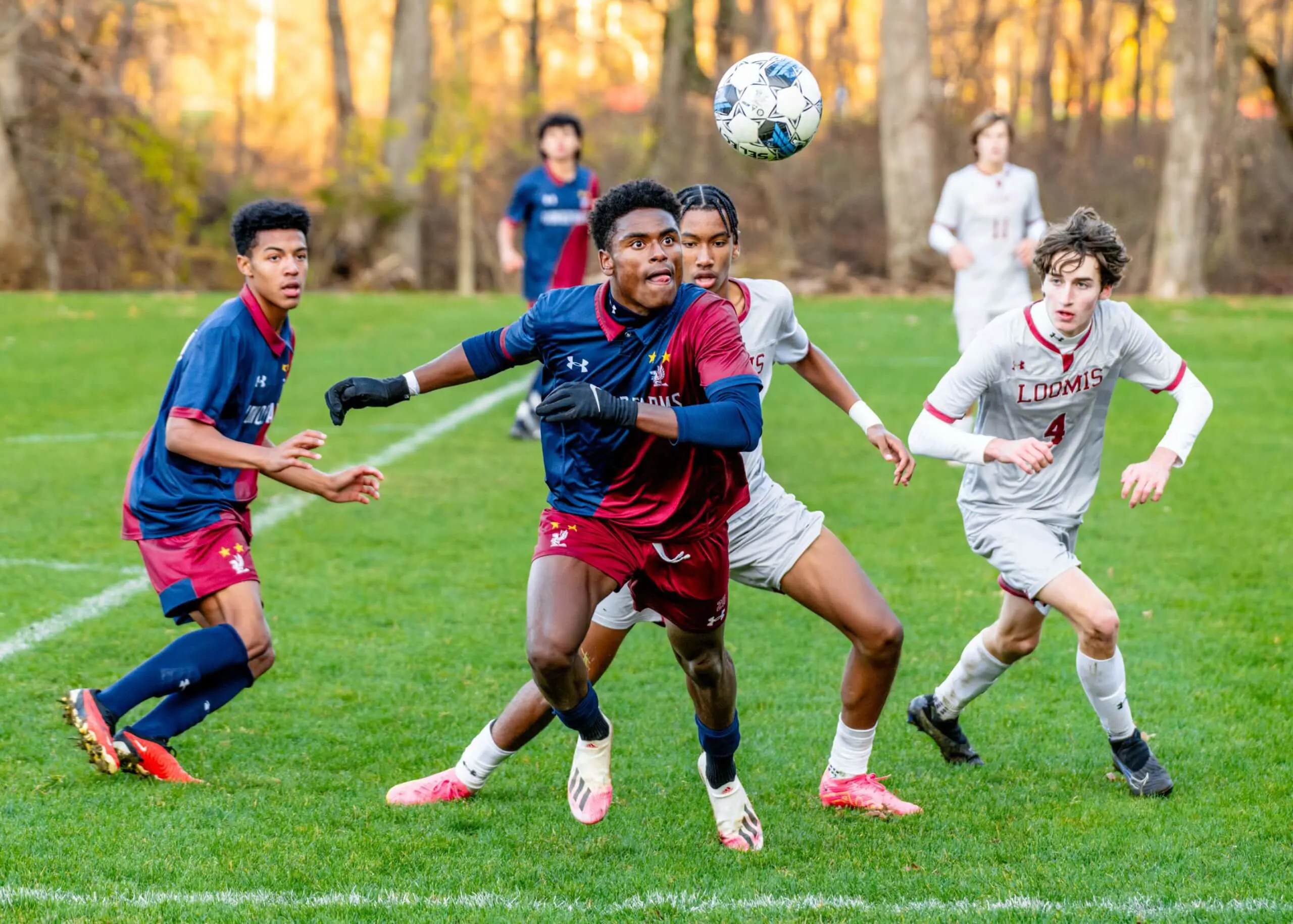 Avon Old Farms students playing a soccer match