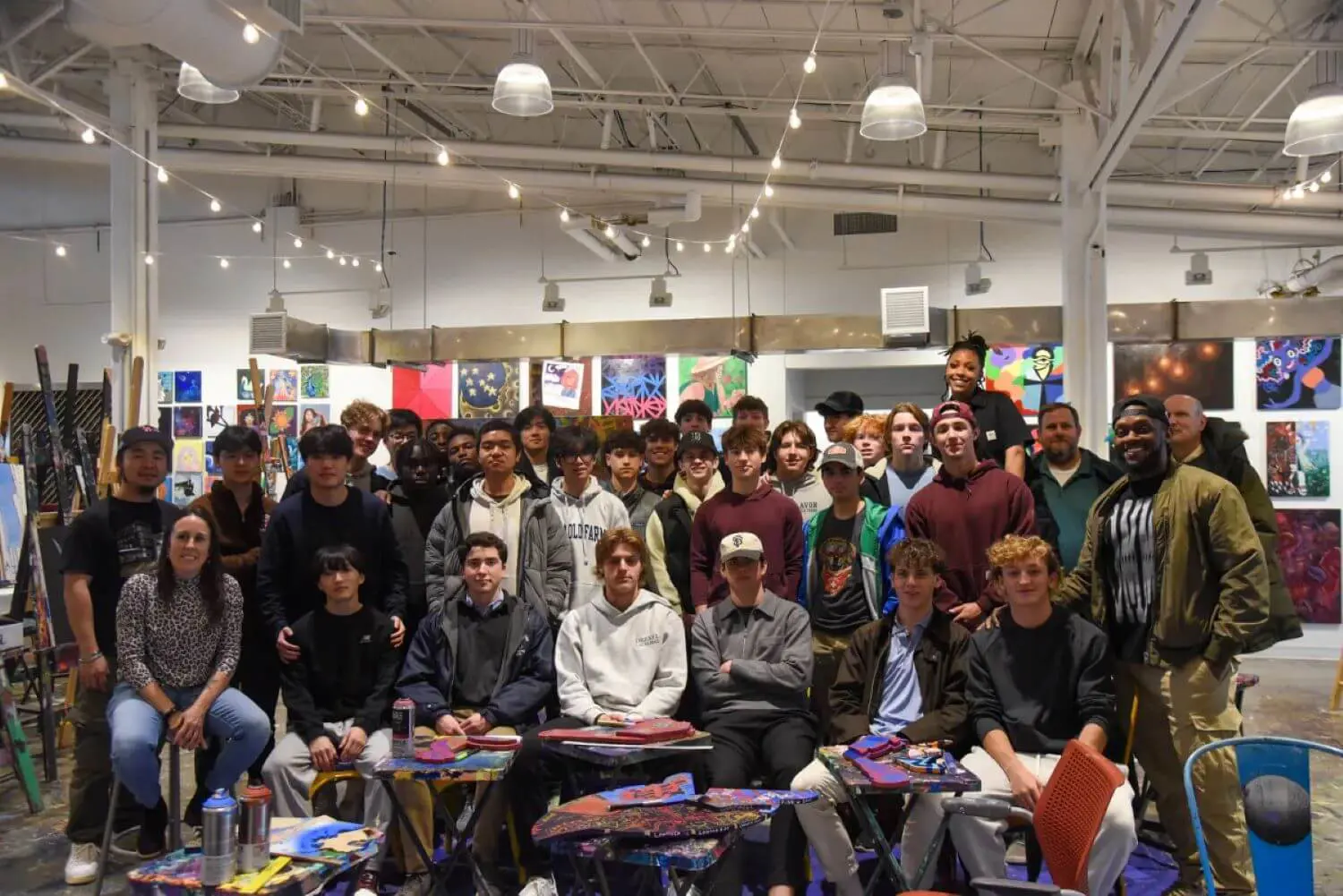 Avon Old Farms students working on a collaborative art project at Artists For Humanity (AFH).