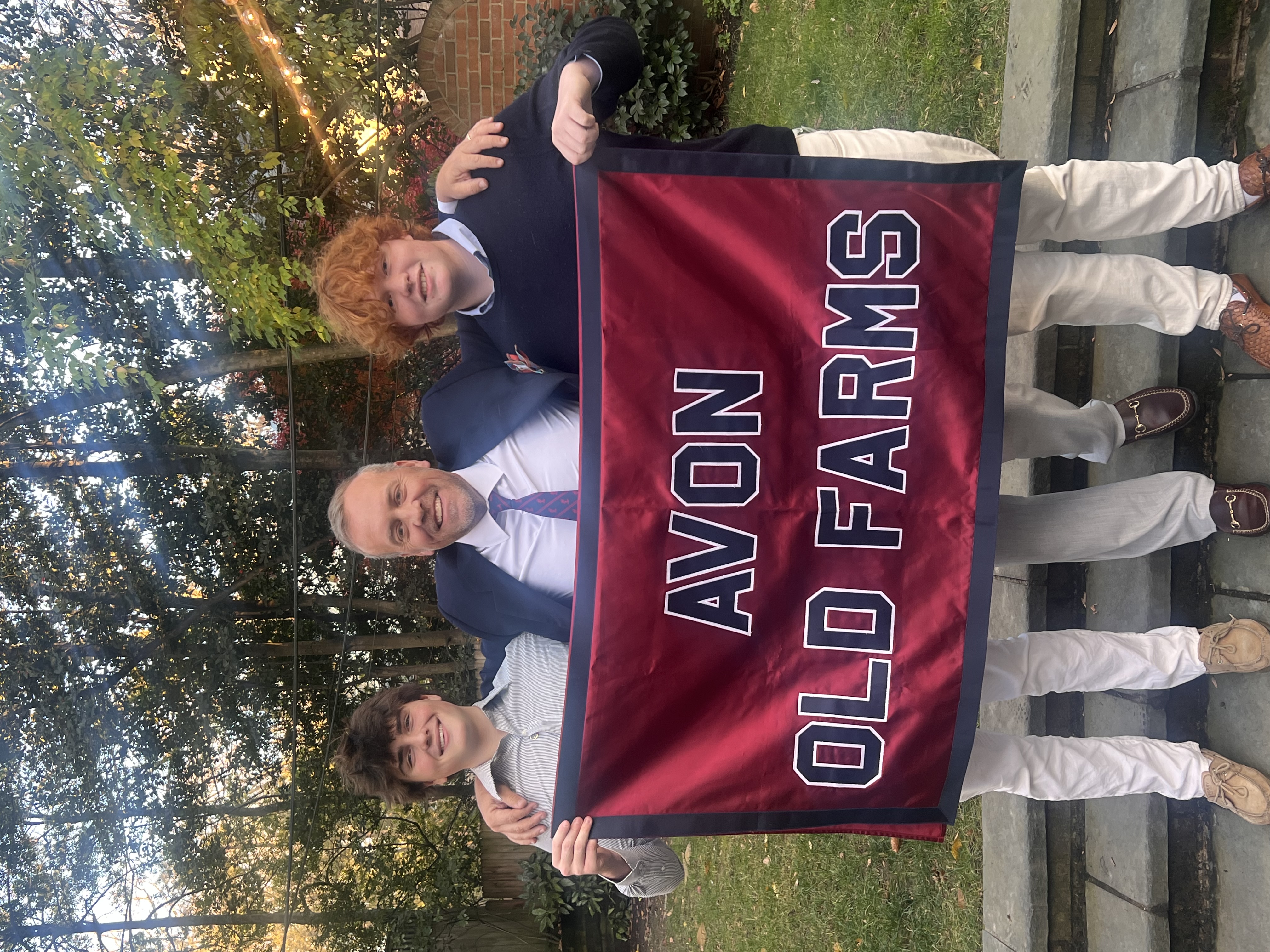 Avon Old Farms Alumni with Flag