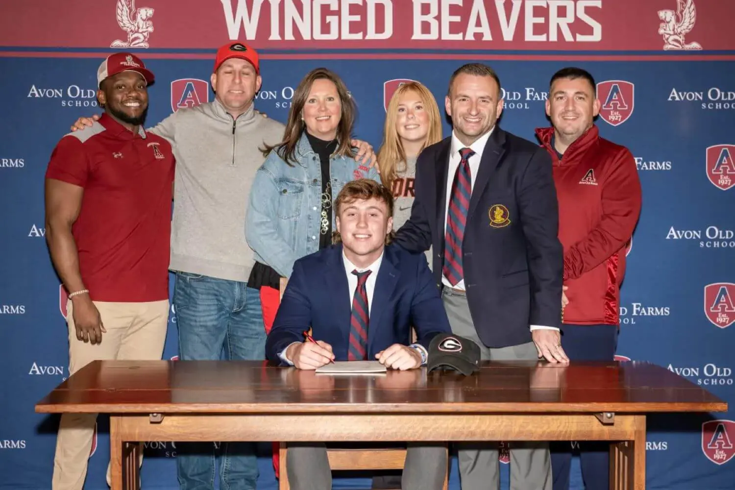 Ryan Puglisi signing a National Letter of Intent to play football on scholarship at the University of Georgia.