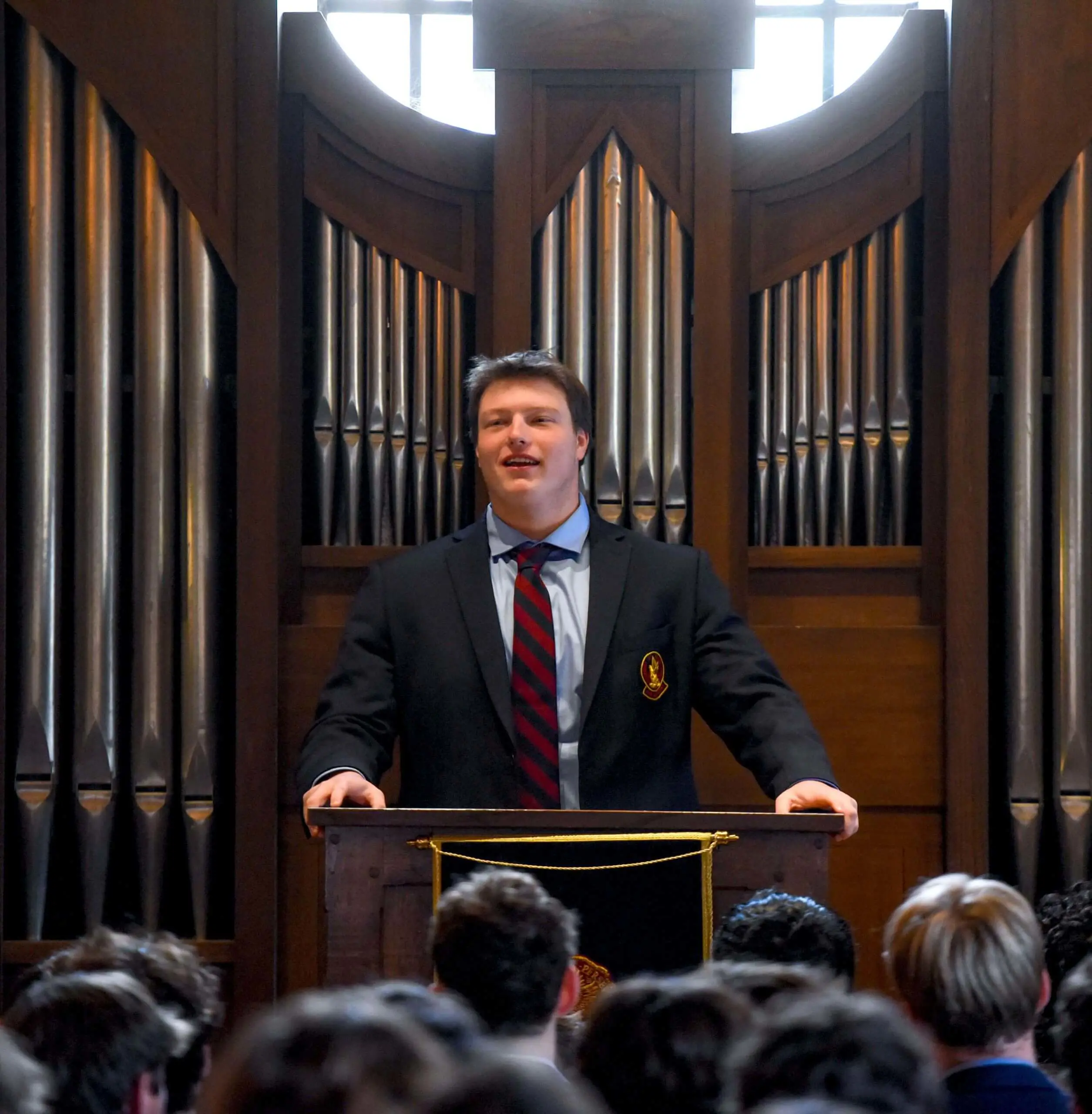 Avon Old Farms student speaking in Chapel.