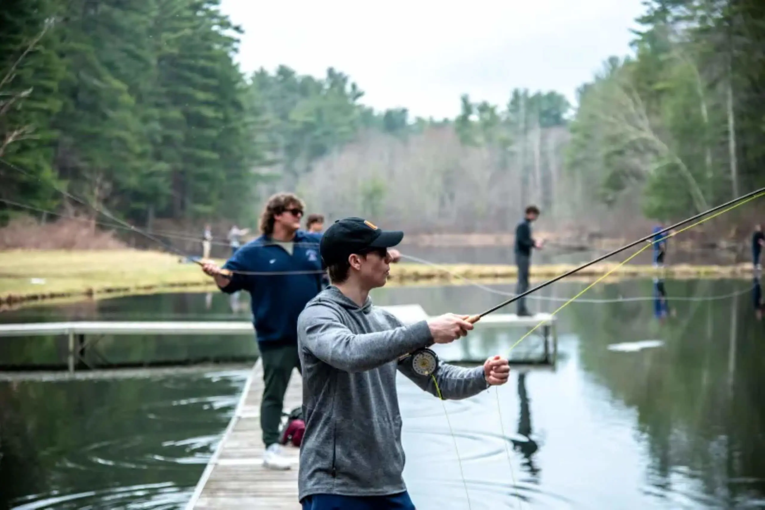 Avon Old Farms students fishing at Beaver Pond.