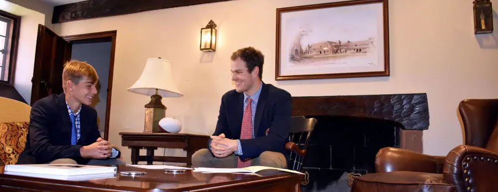 Avon Old Farms Admissions Officer interviewing a prospective student.