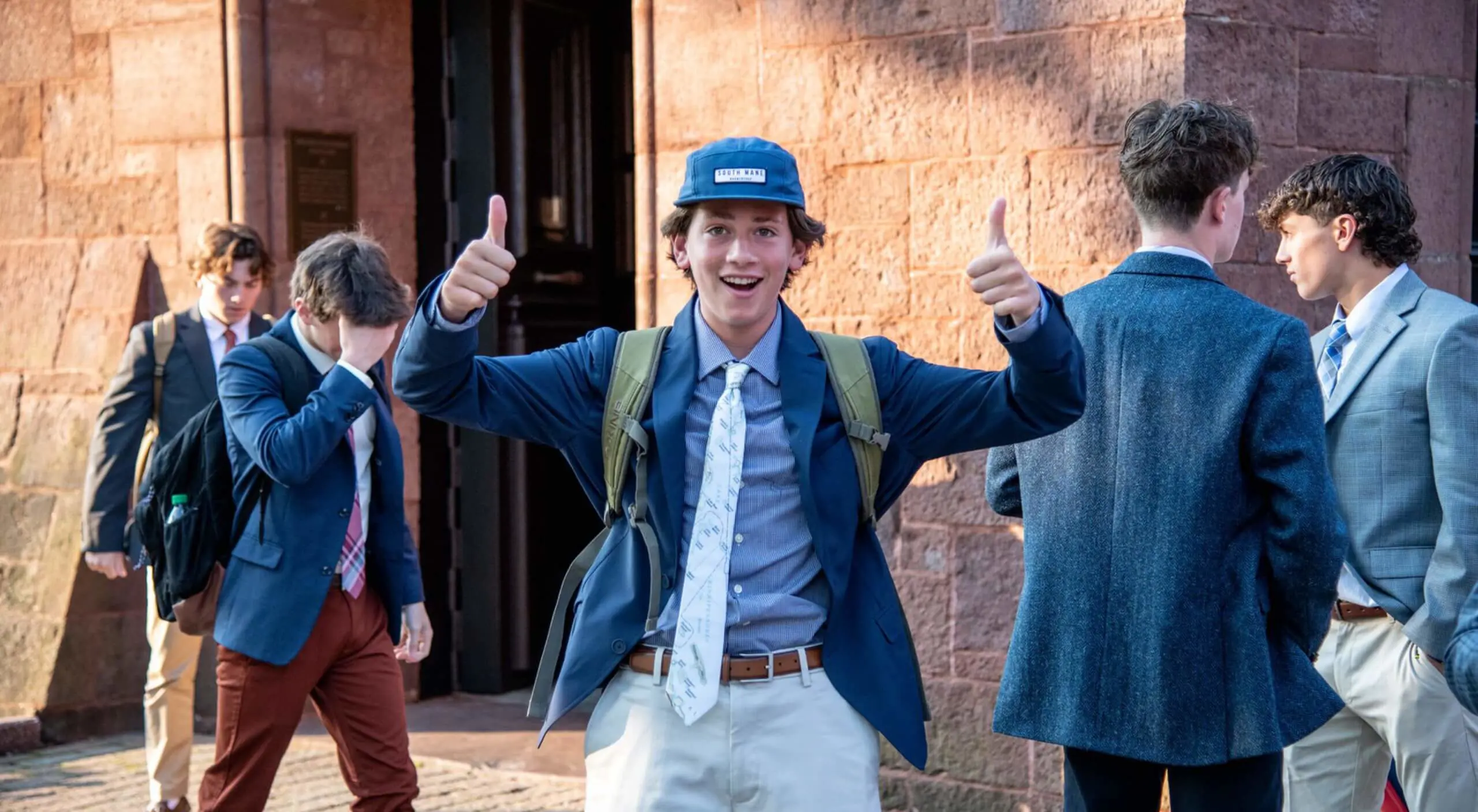 Avon Old Farms student thumbs up