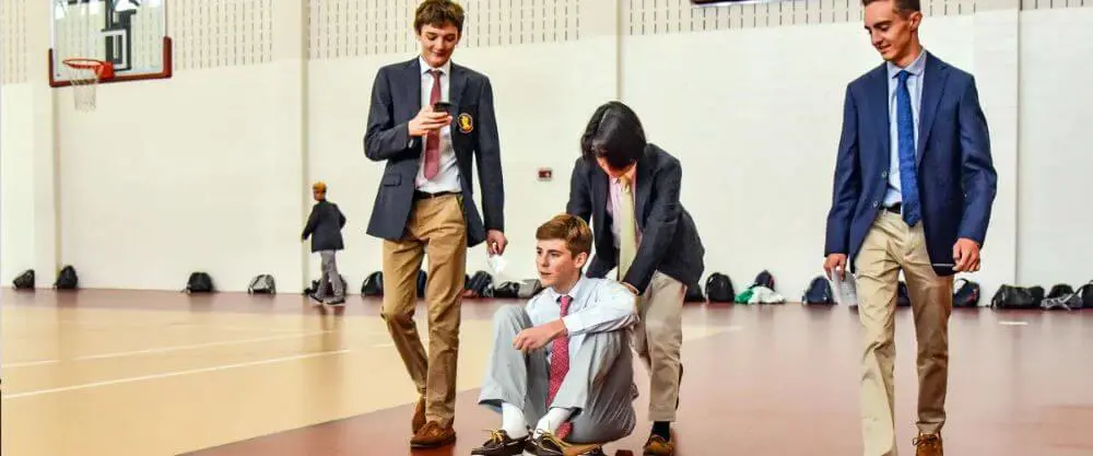 Avon Old Farms students in gym hall.
