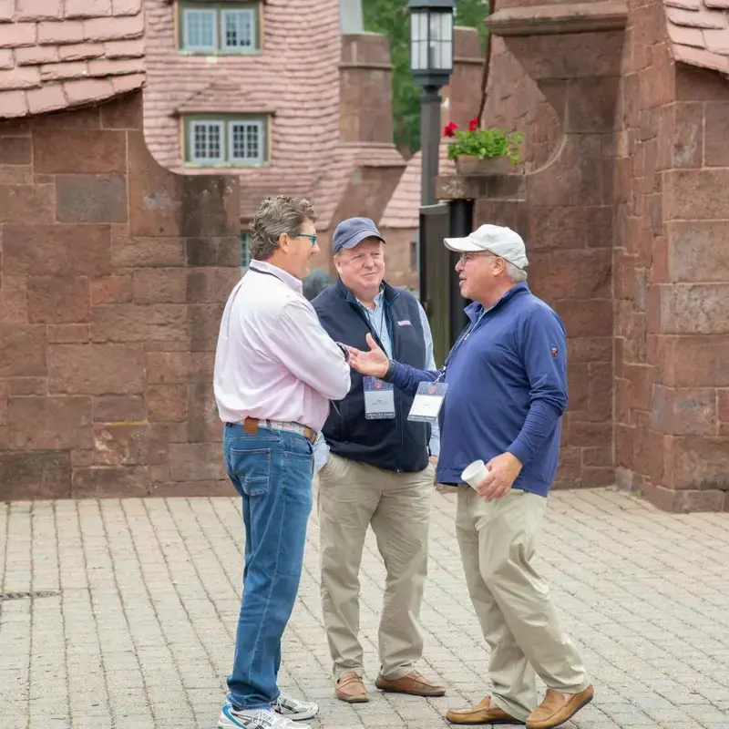 Three Alumni reminiscing on Avon Old Farms' campus